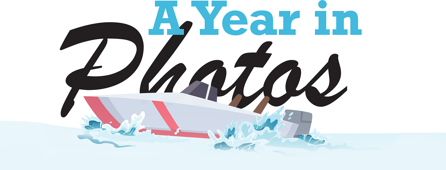 A Year in Photos typography with a boat in water graphic