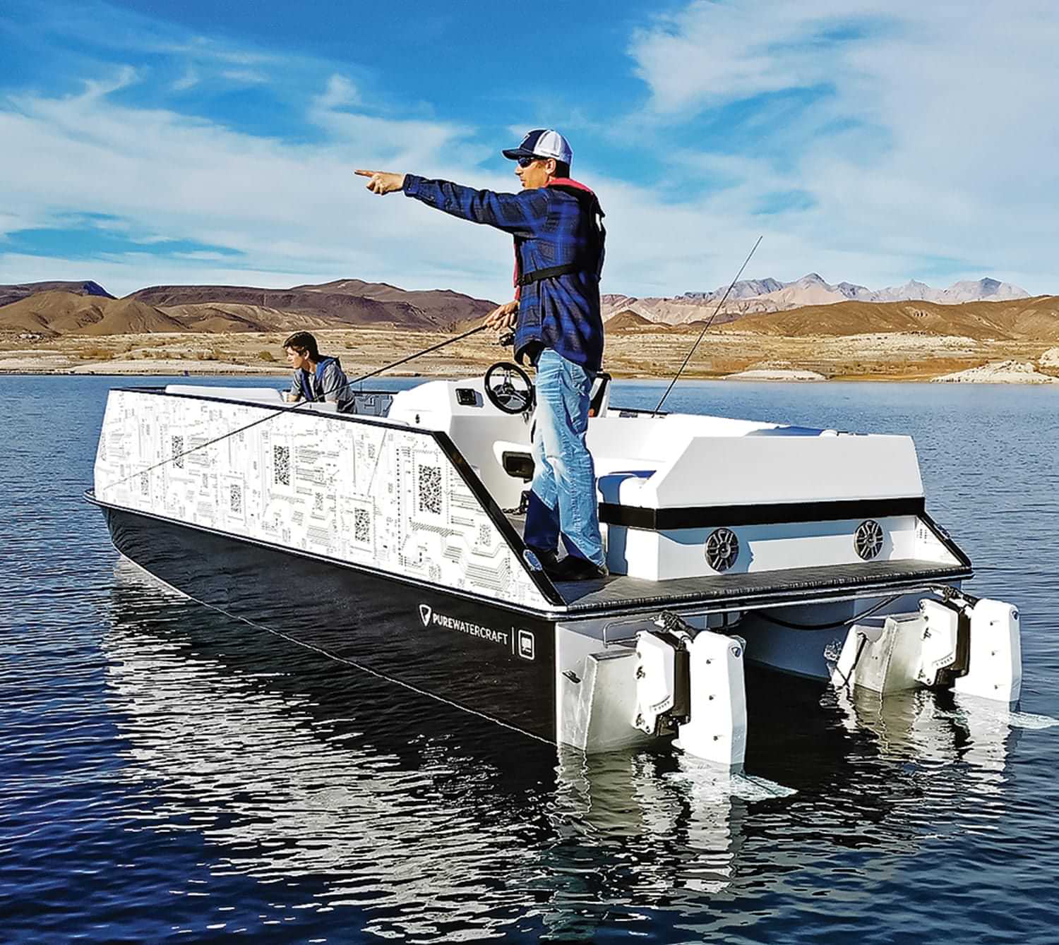 a man stands on a General Motors Pure Watercraft Pontoon in the middle of a large lake