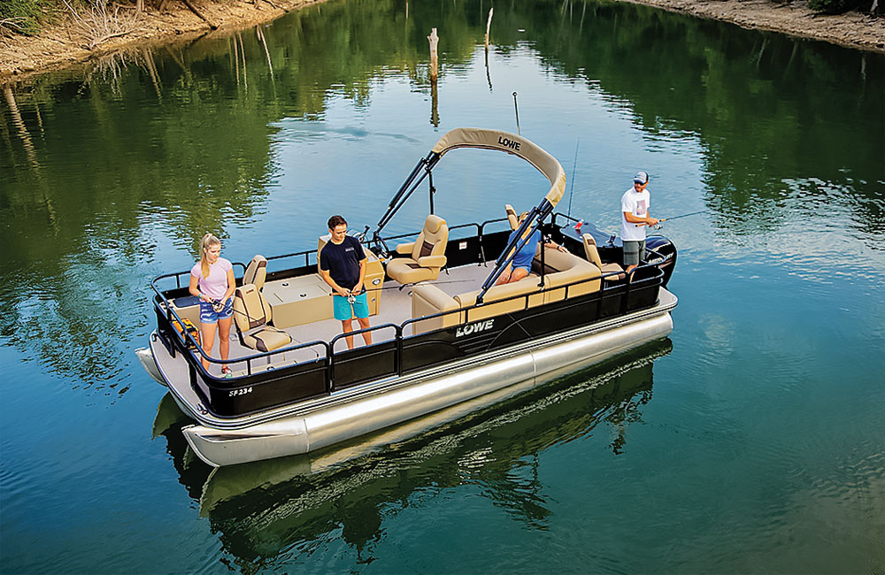 a family enjoying their pontoon on a lake