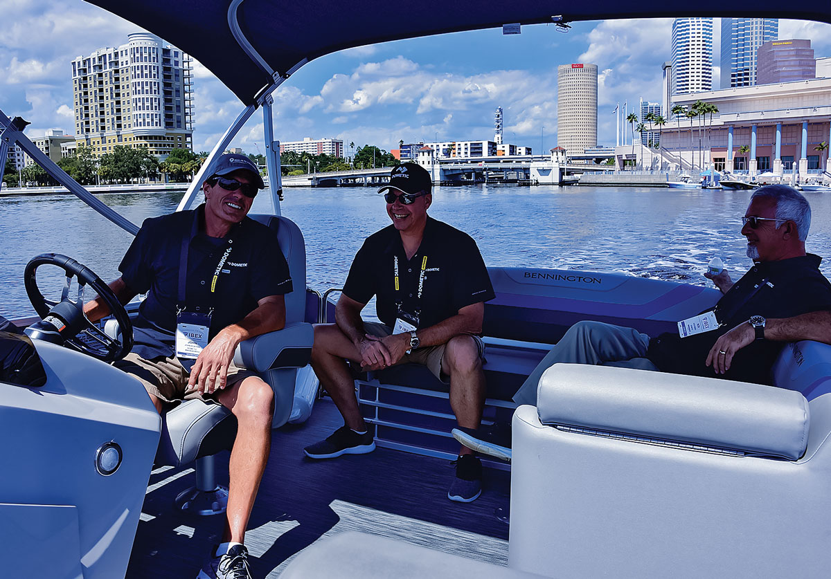 The Dometic crew (From L to R) John Porter, David Wolfe and Ron Gebbia enjoy a day on the water during the IBEX Show in Tampa, Fla