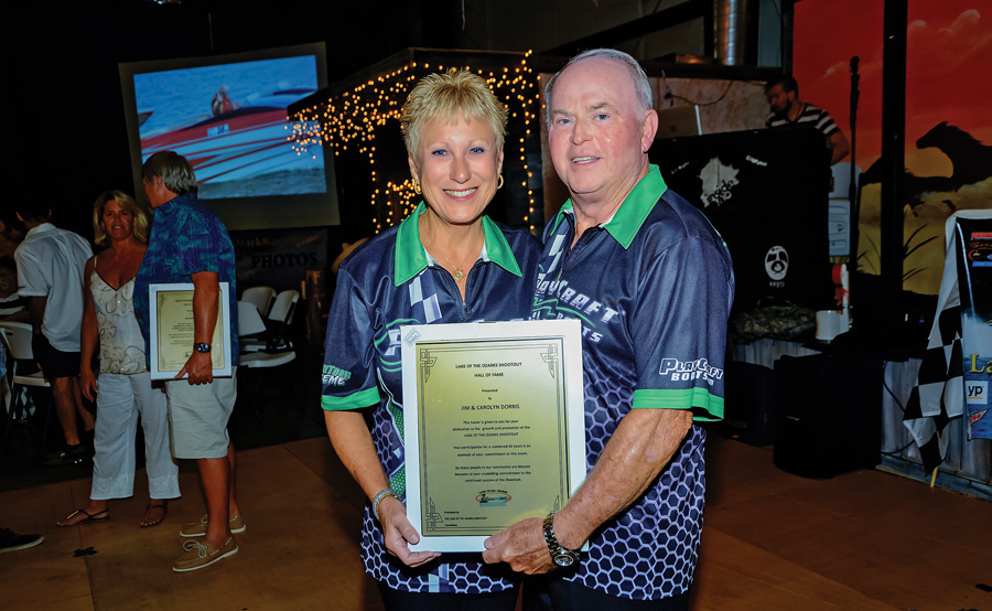 Jim and Carolyn Dorris with an award