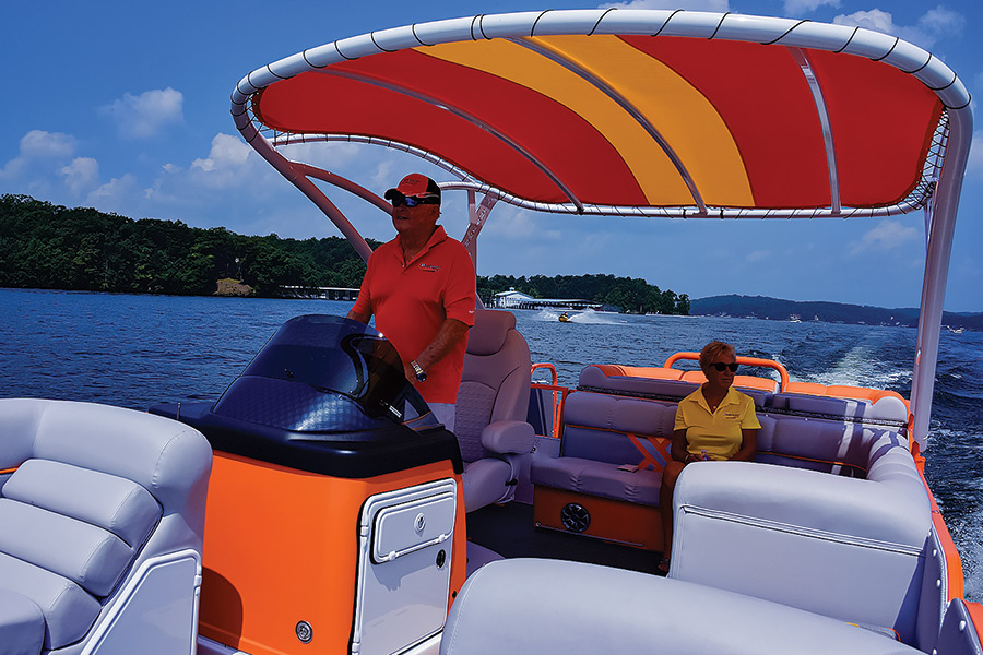 man and woman driving boat