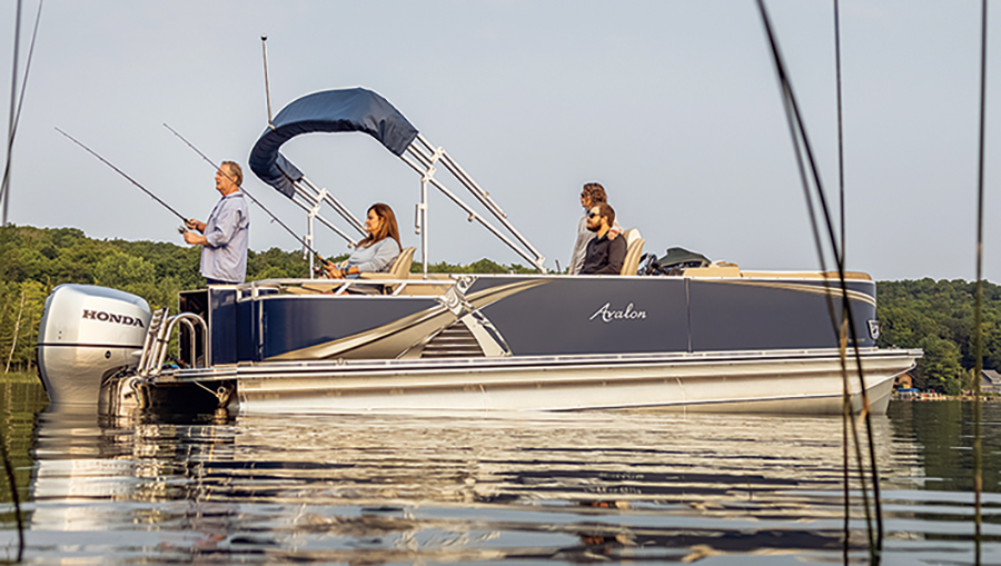 family on deck space of boat