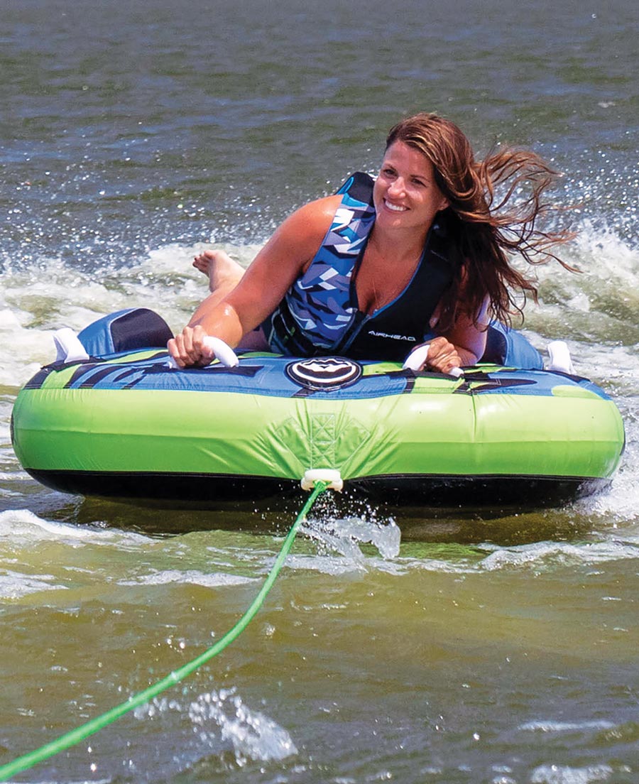 woman riding a Shield by Airhead raft