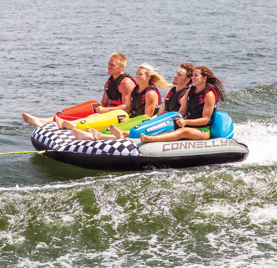 group of four people riding the Daytona 4 raft