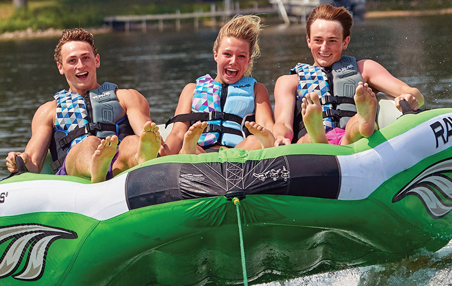 group of people riding the Wake Hawk raft