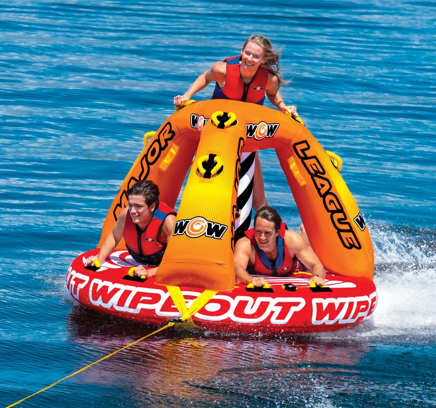 group of people using the Wipe Out raft