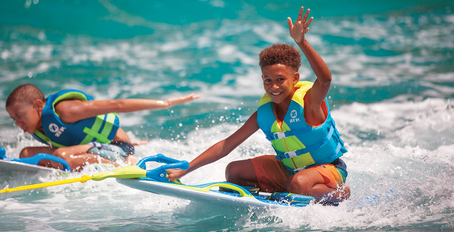 kid riding a YouGotThis Board