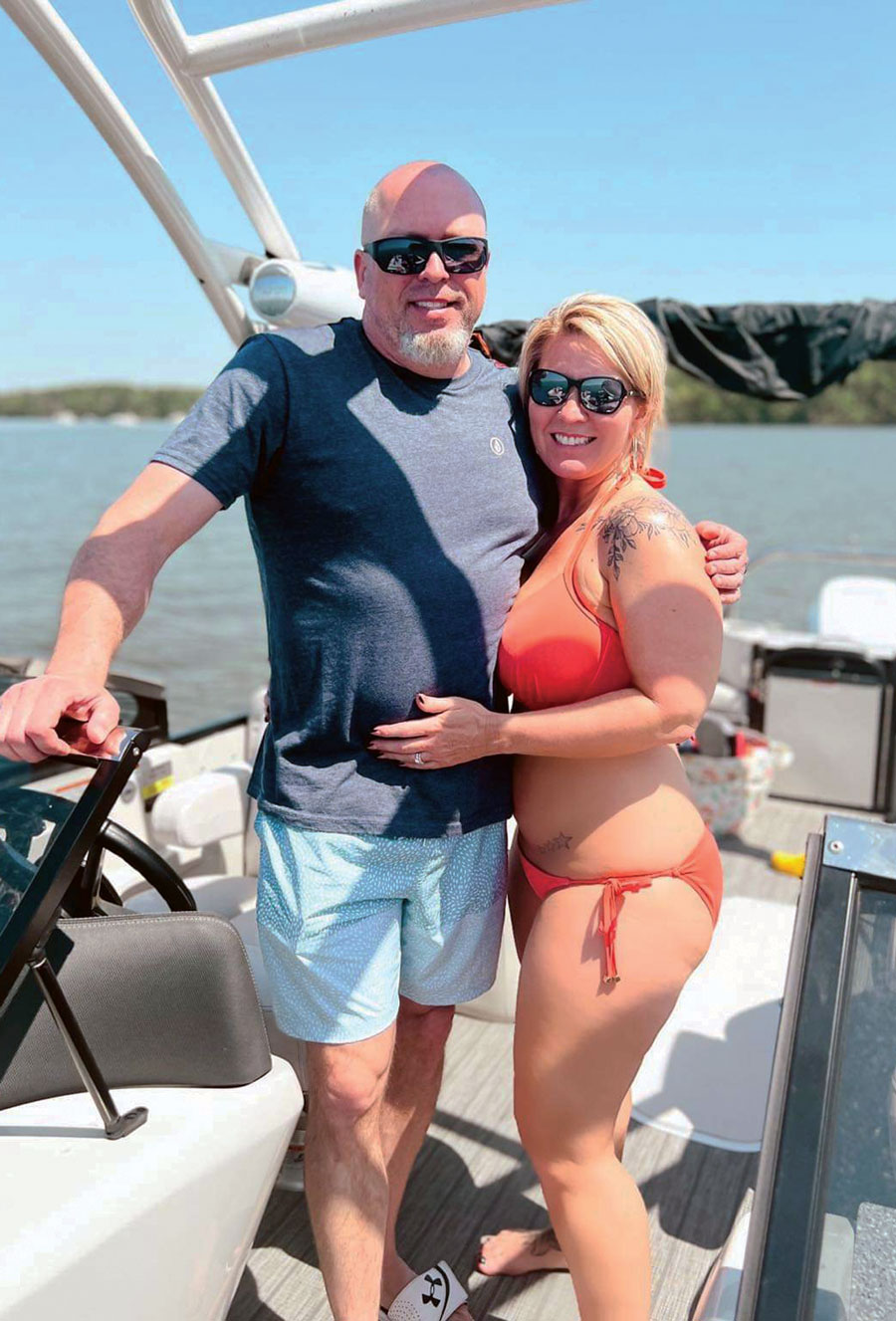 Gary Mashburn and his wife on their boat