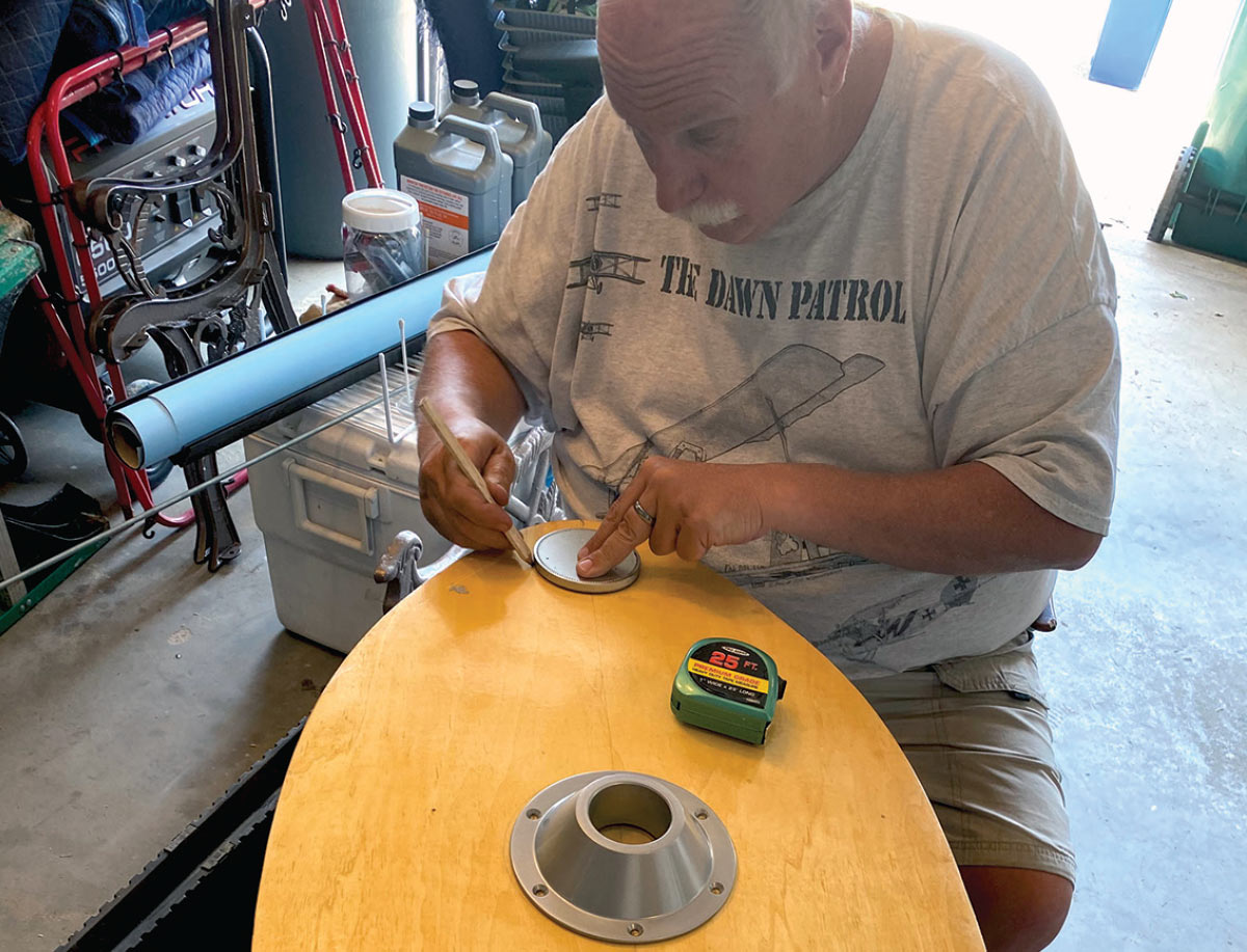 Man working on boards