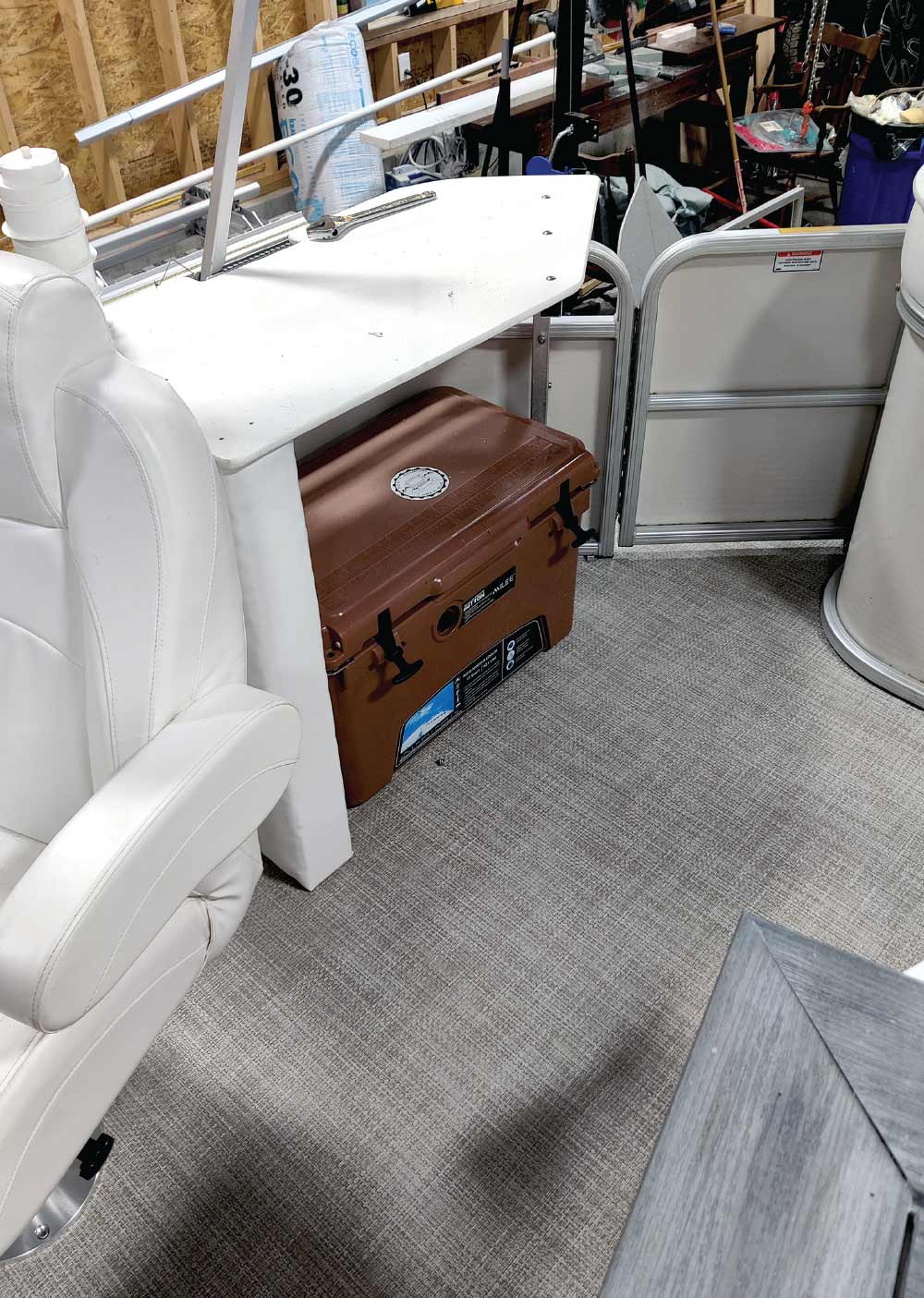 Cooler under boat's table