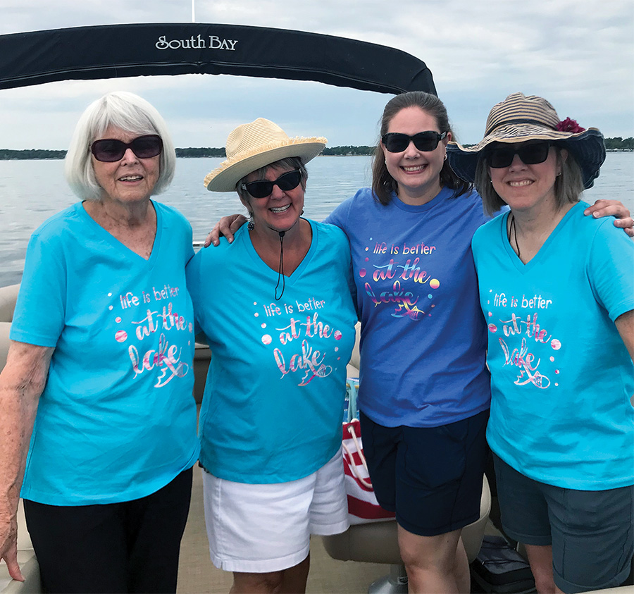 four ladies smiling on the boat