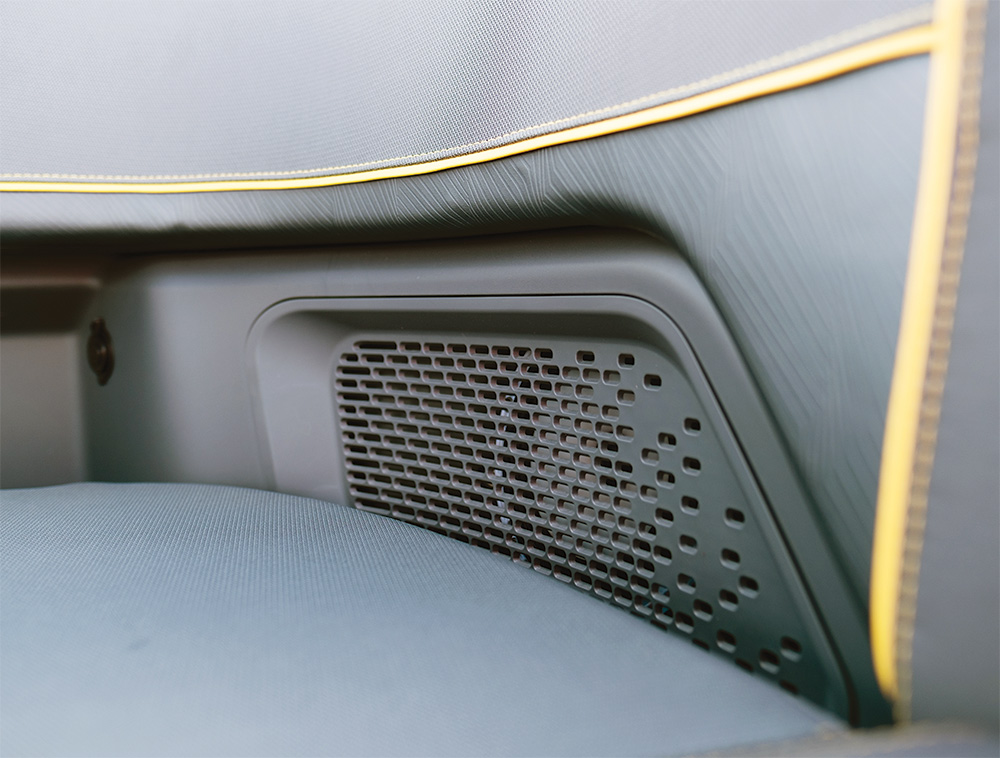 Close shot of imbedded speakers in seats