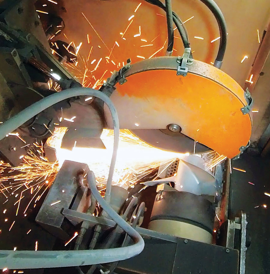 saw blade being used and sparks flying