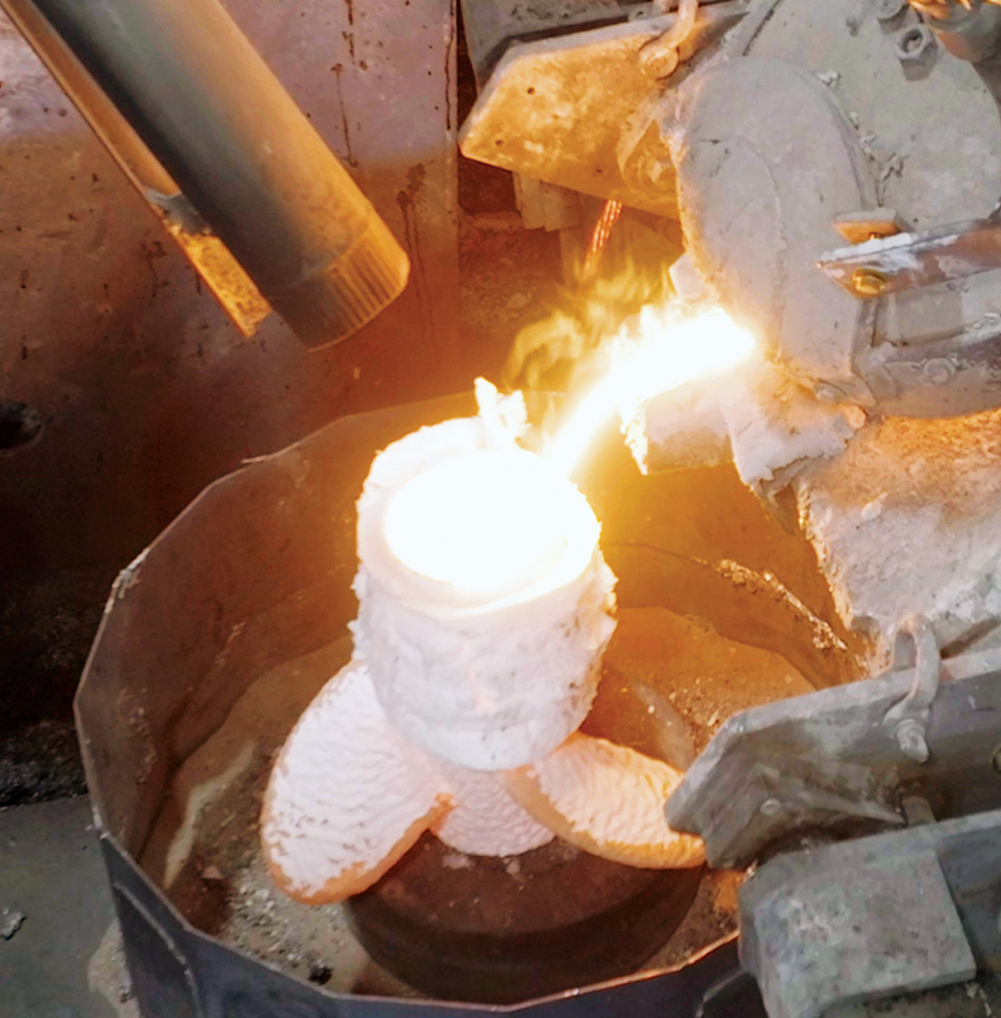 melted metal being poured into a propellor