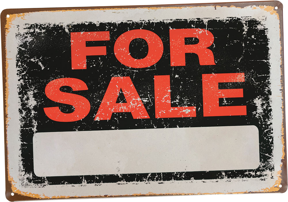Beat up and rusty "For Sale" sign