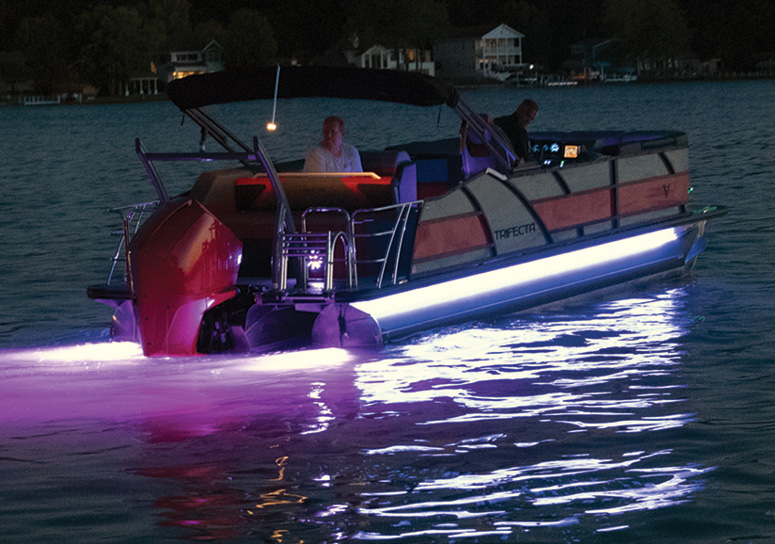 Trifecta boat with purple underlights