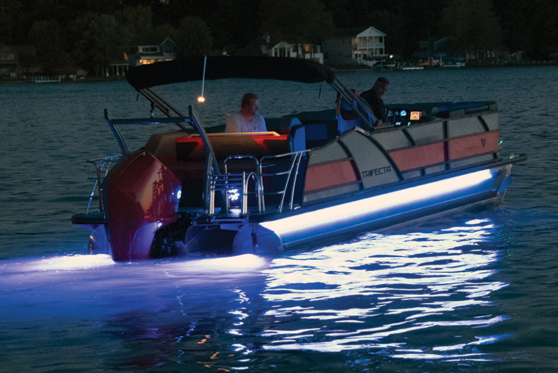 Trifecta boat with blue underlights