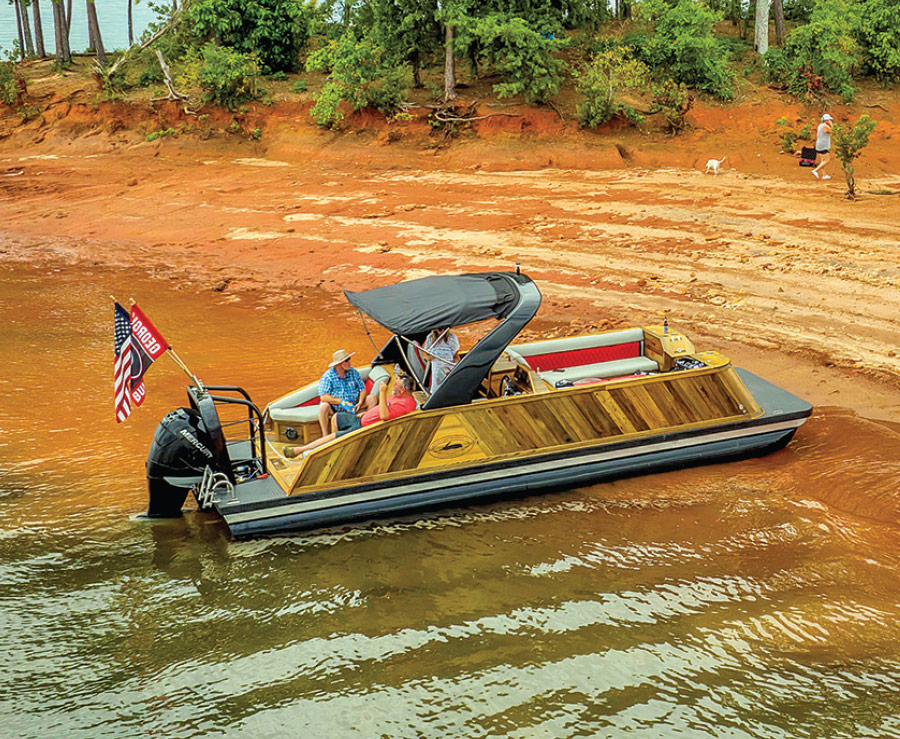 custom boat on the sand of the shore
