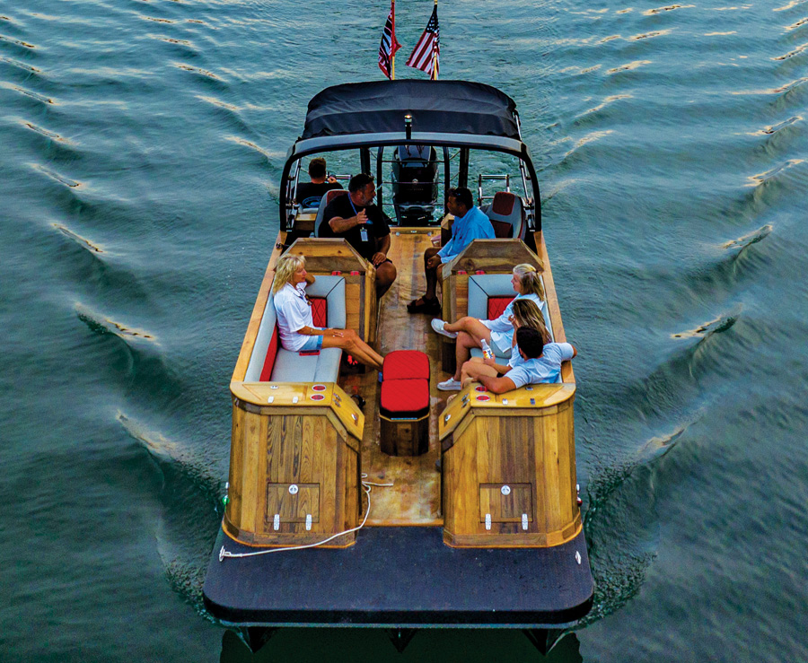 boat in water full of people in seats