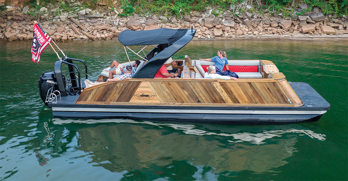 side view of custom boat in water