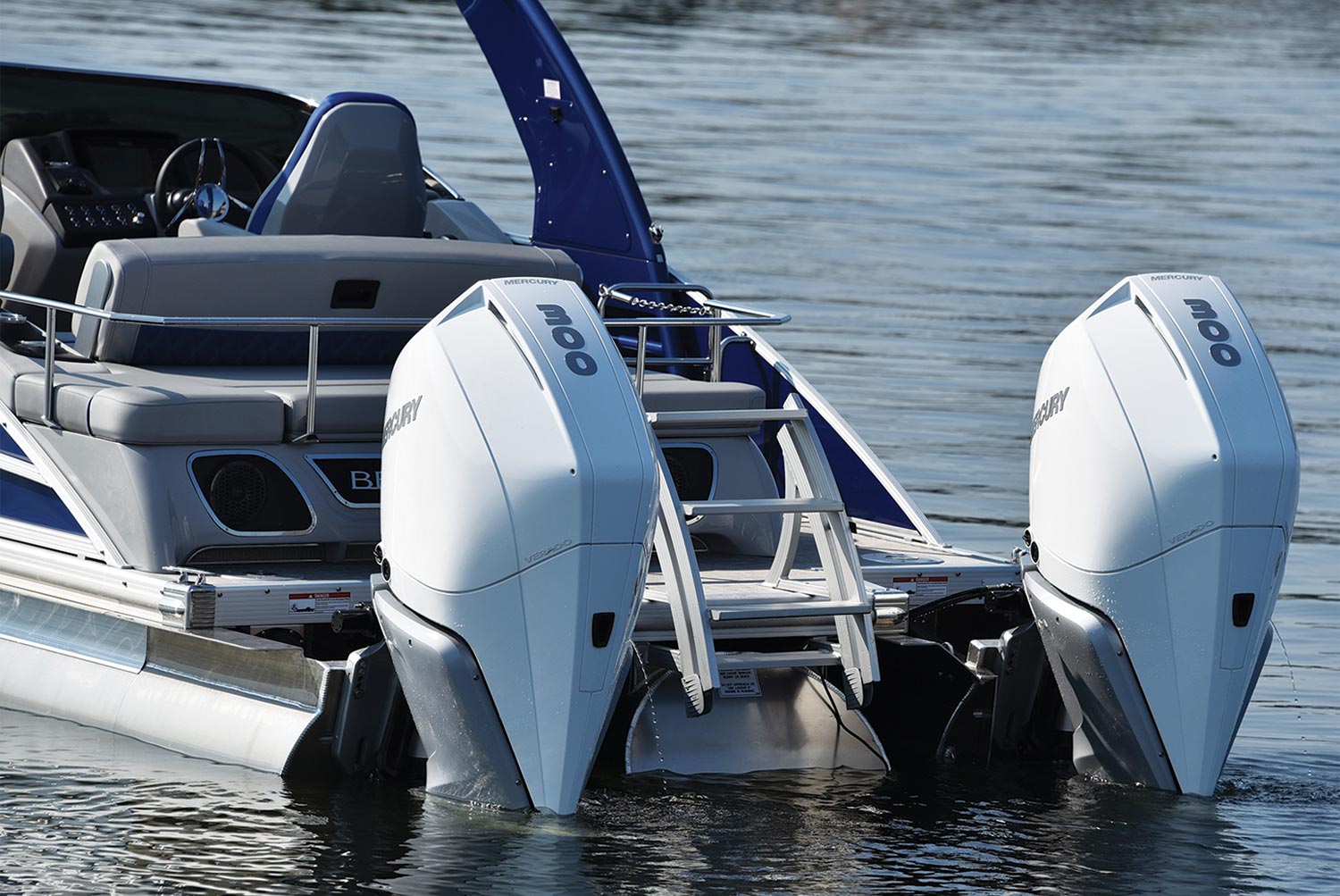 27 Q Swingback's dual Mercury 300 outboards