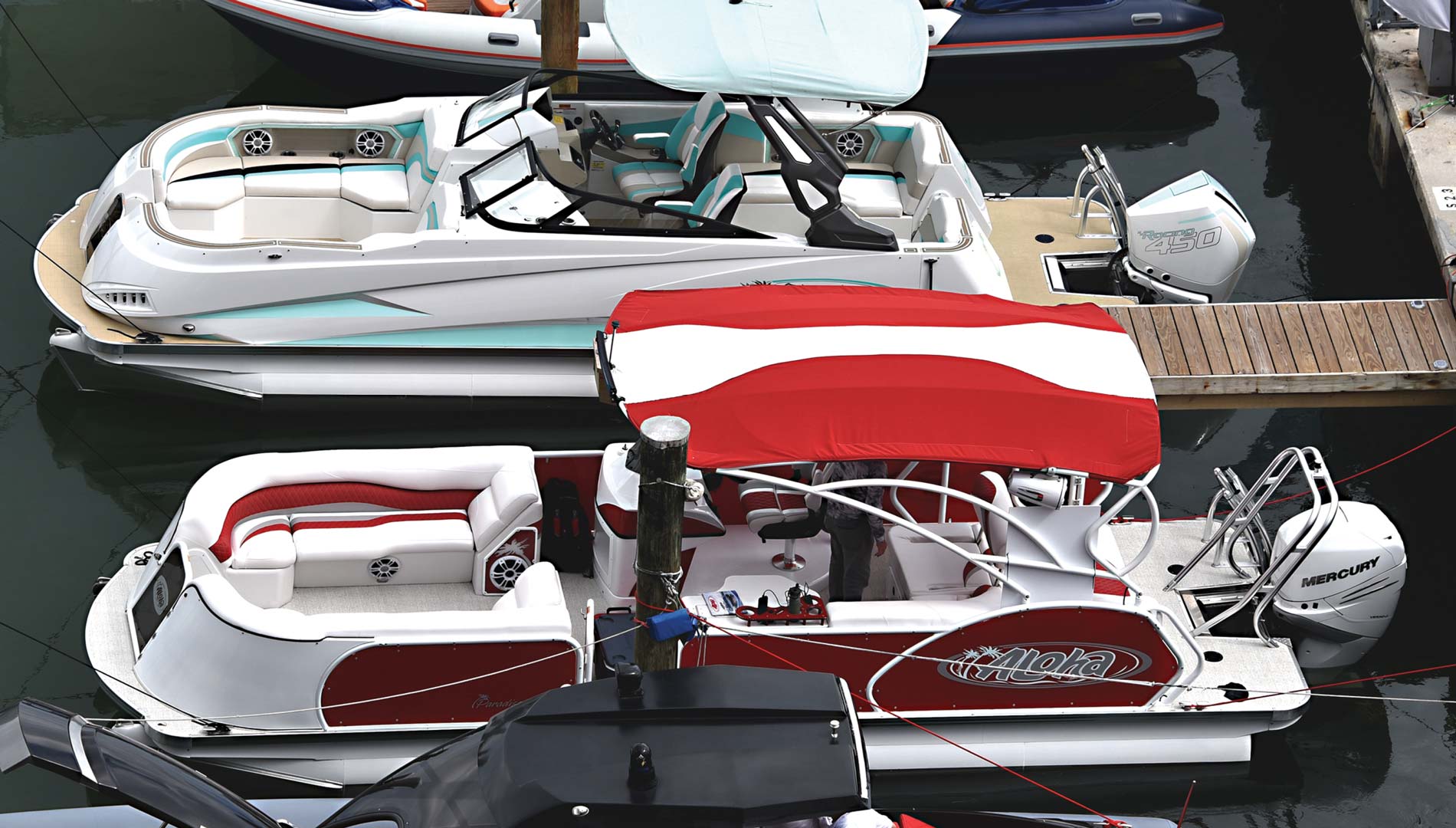 Docked Aloha pontoons at the show