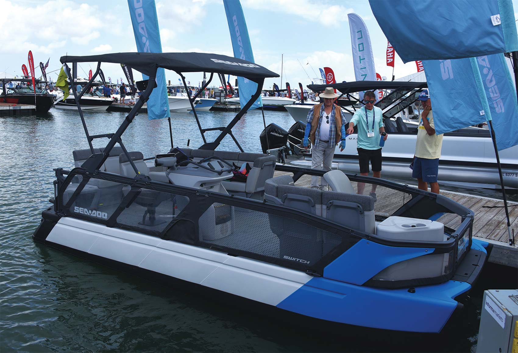 Blue and white Sea-Doo Switch pontoon
