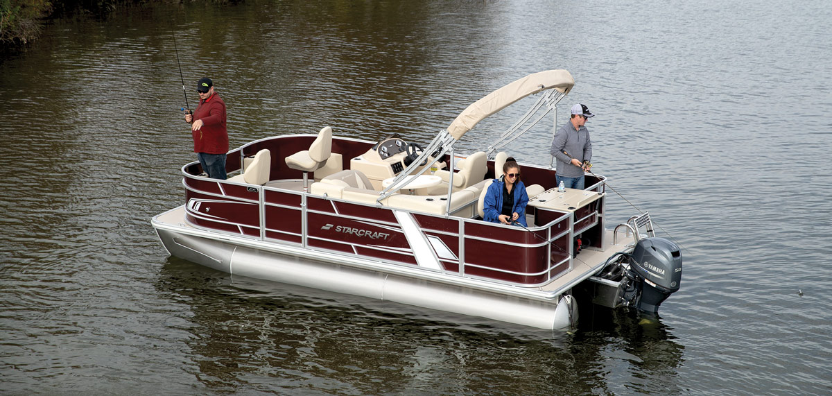 family on red boat fishing