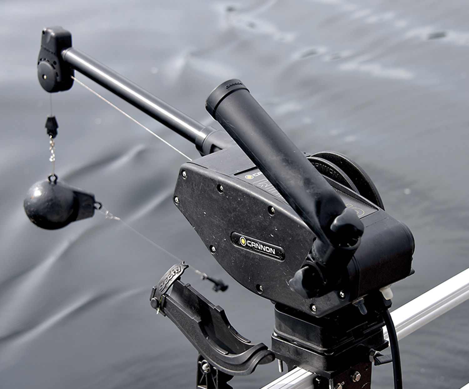 close view of a Cannon downrigger on a pontoon