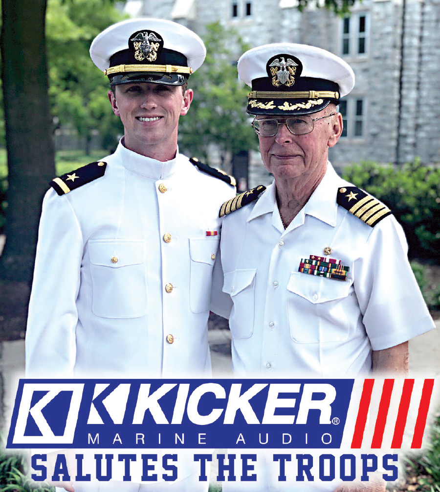 Robert E. Rumney smiling with soldier 