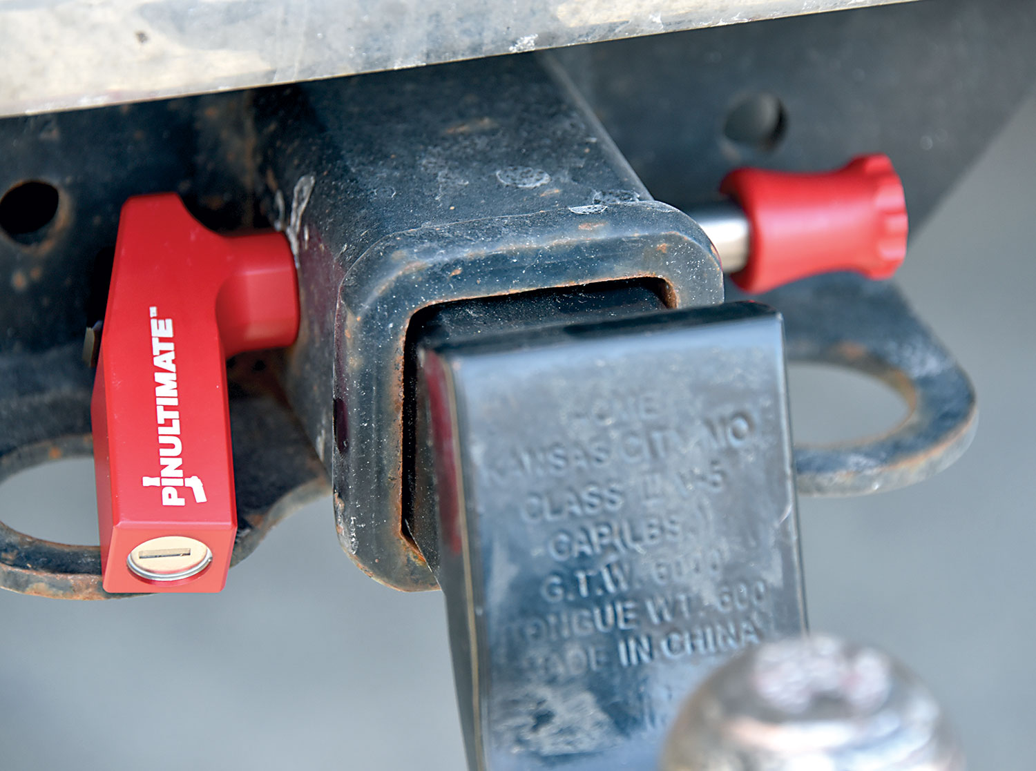 Close-up photograph perspective of the new all-titanium PinUltimate Quick-Release Hitch Pin