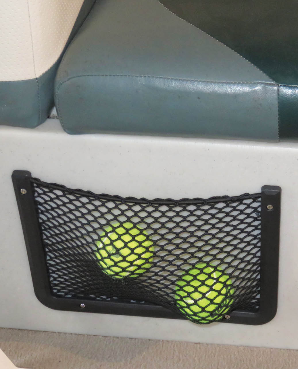 plastic net holding tennis balls