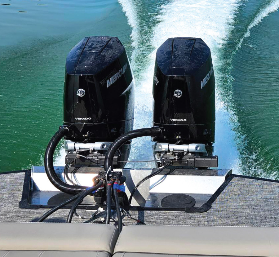 two Mercury engines on rear of running boat on water