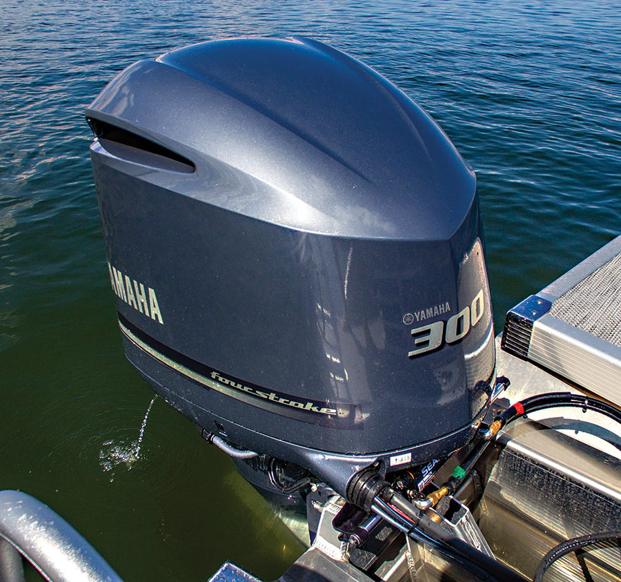 Close-up view of the Yamaha 300 Four Stroke outboard motor engine from the Bennington Sport 24 LXSSBA pontoon motorboat vehicle