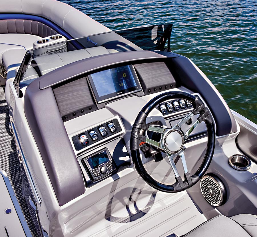Close-up aerial view of the driver's seat area of the Bennington Sport 24 LXSSBA pontoon motorboat vehicle
