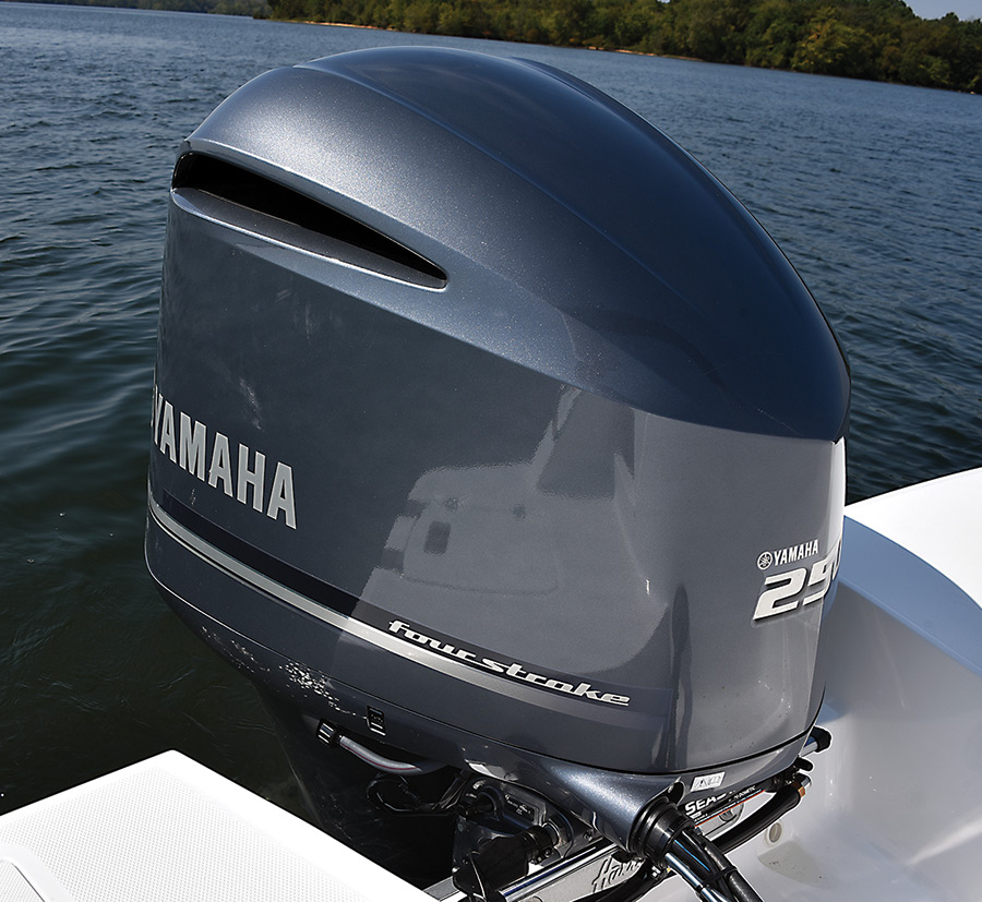 Close-up view of the Yamaha F250 XB outboard motor engine from the Hurricane SunDeck 235 pontoon motorboat vehicle