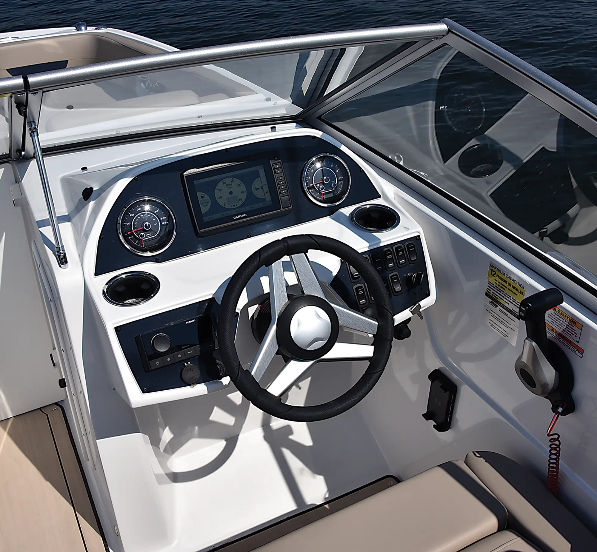 Aerial interior photo view of the driver's side area of the Hurricane SunDeck 235 pontoon motorboat vehicle