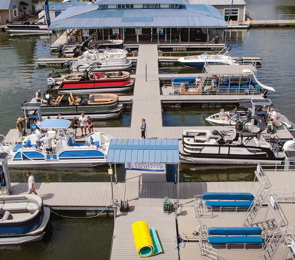 boat dock filled with pontoon boats