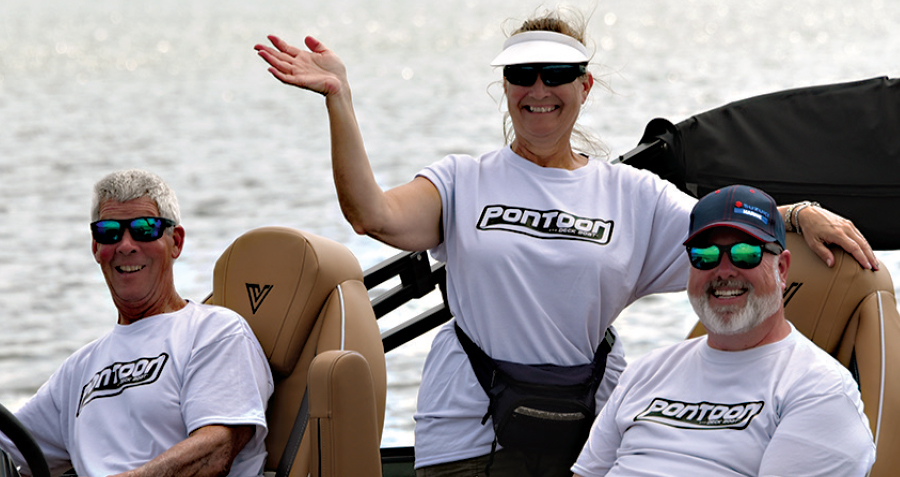 Malcolm “Goofy” Sohm, Terry Sohm and Kevin Malcom smiling on boat