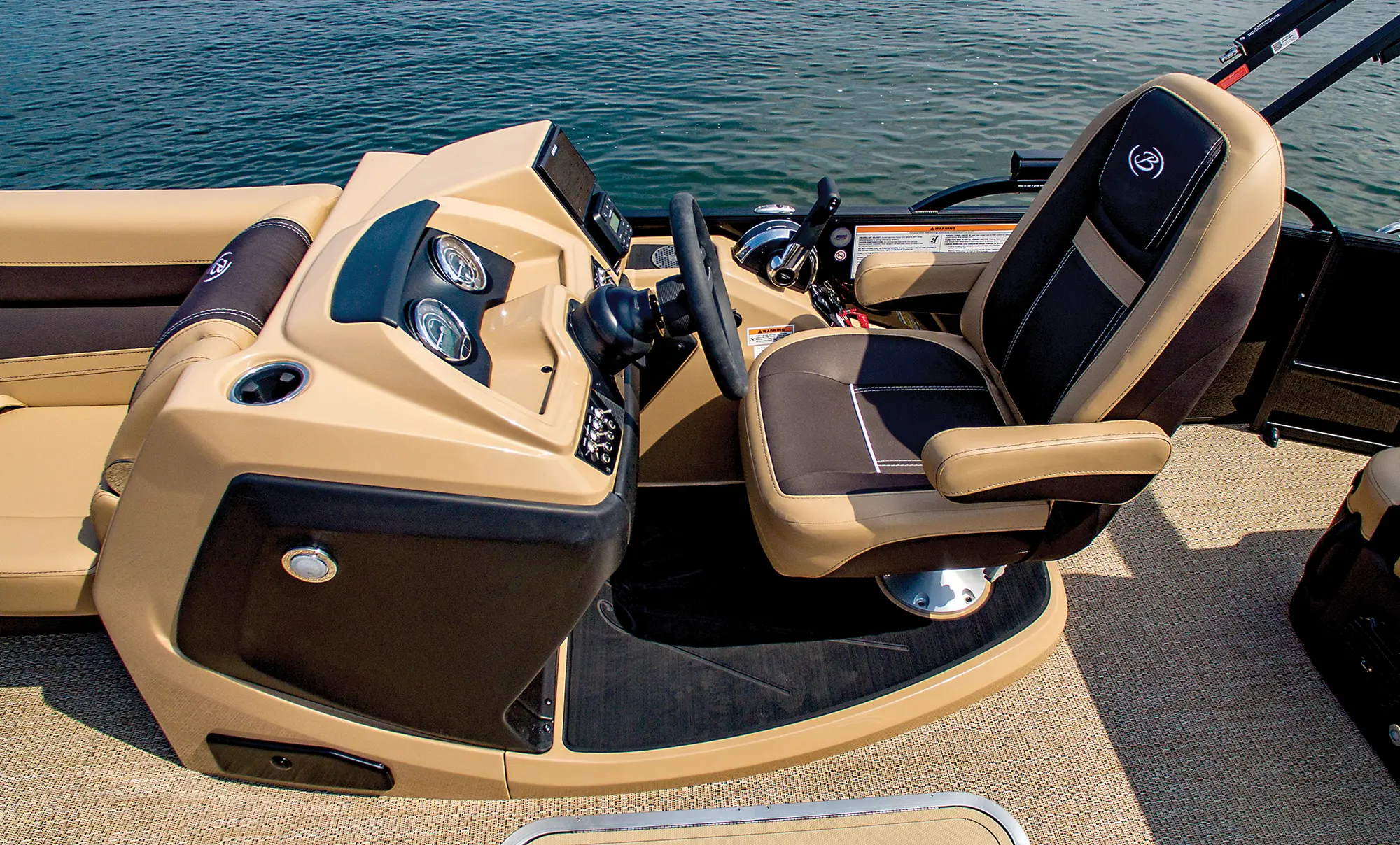 Landscape close-up side photograph view of the Barletta Cabrio C22UC pontoon motorboat vehicle's driver side seat area