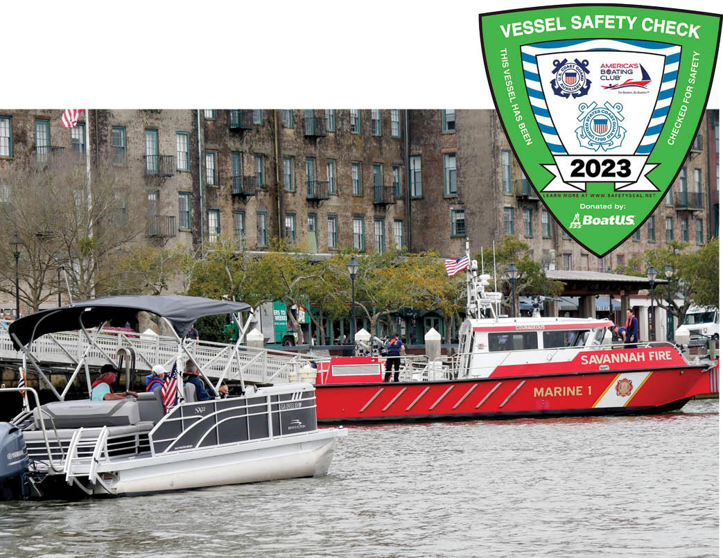 2023 Vessel Safety Check badge with two pontoons on water