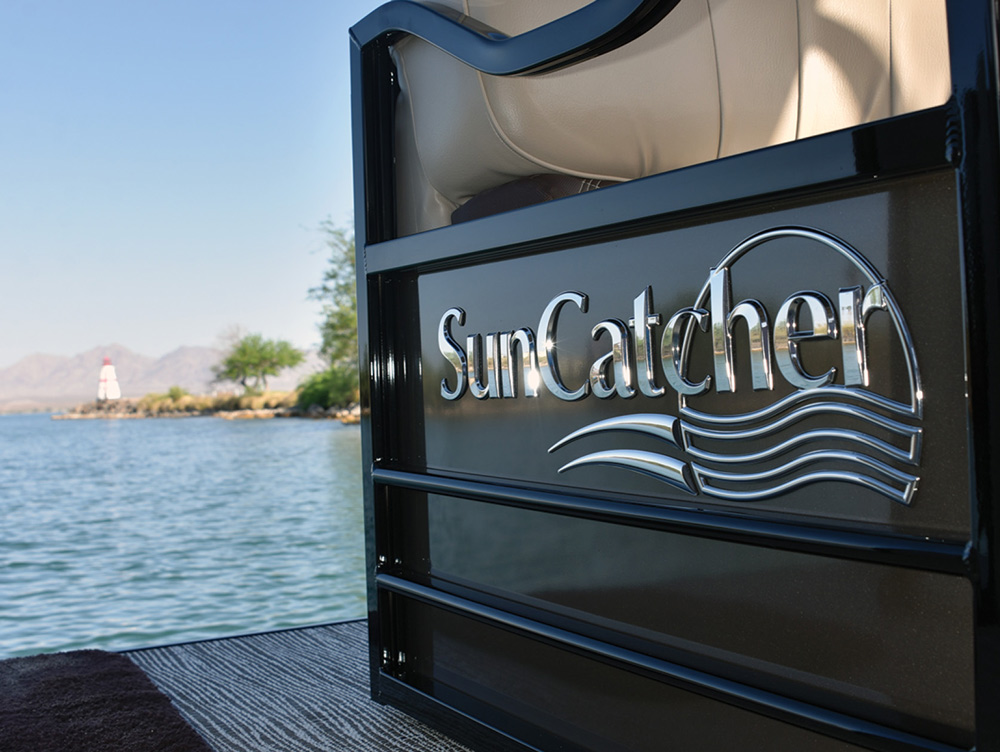 chrome SunCatcher logo on a boat