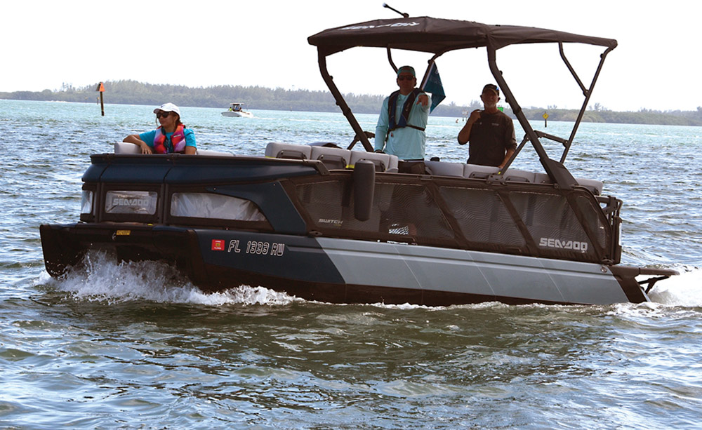 Sea-Doo pontoon sailing in the water