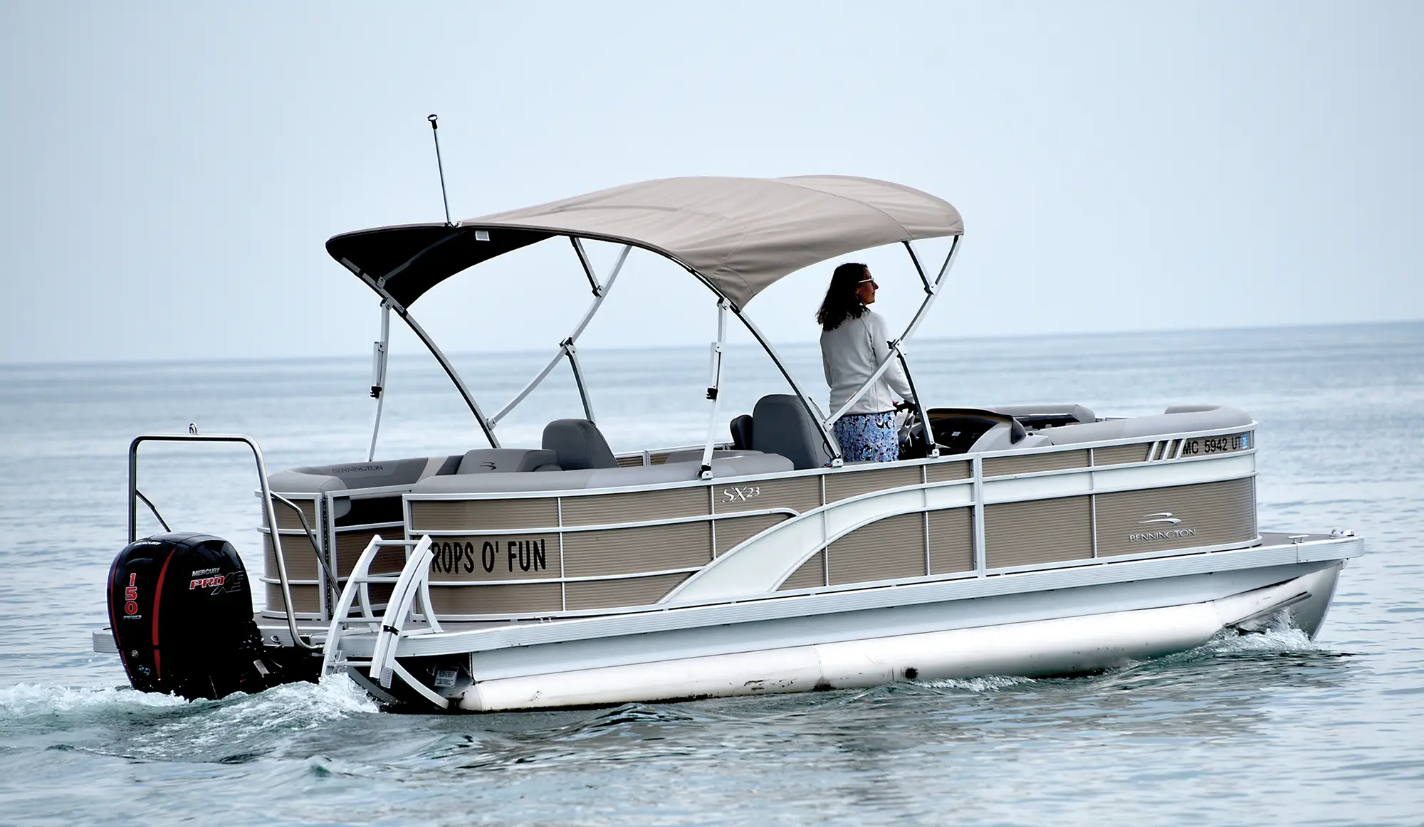 beige-colored pontoon in the water