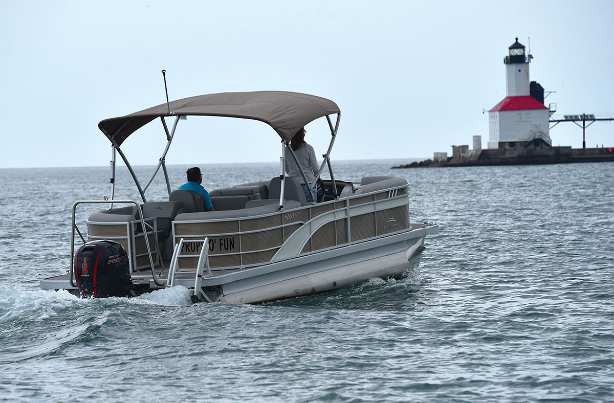 beige-colored pontoon in the water