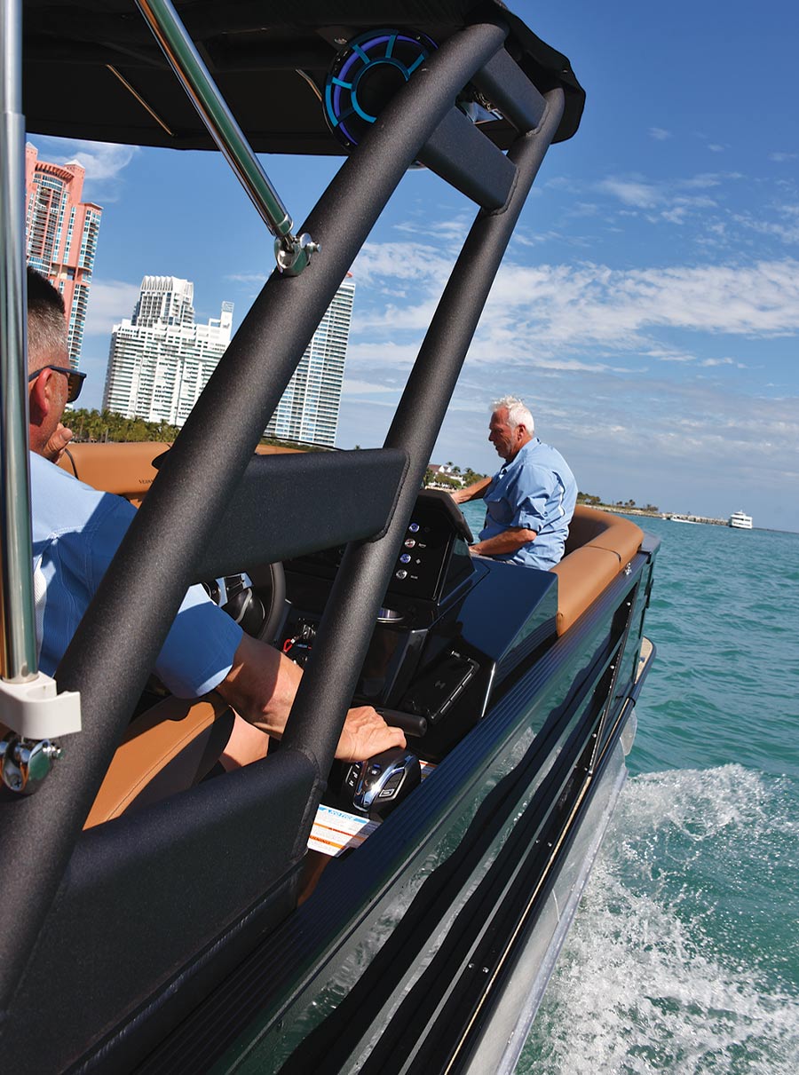 people riding a Veranda Vertex series pontoon