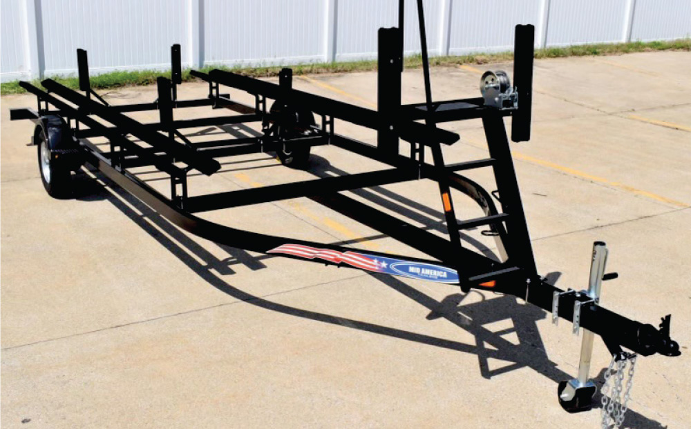 black trailer from Pontoon Trailers parked on driveway