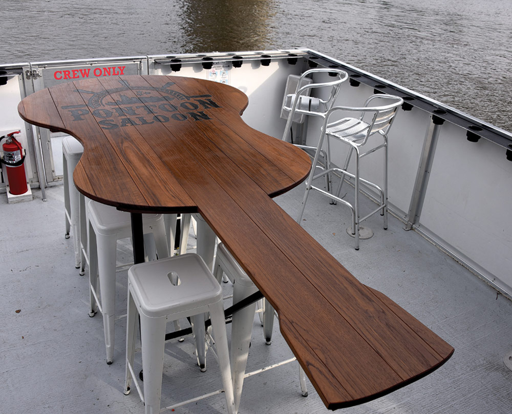 guitar shaped table on the Pontoon Saloon