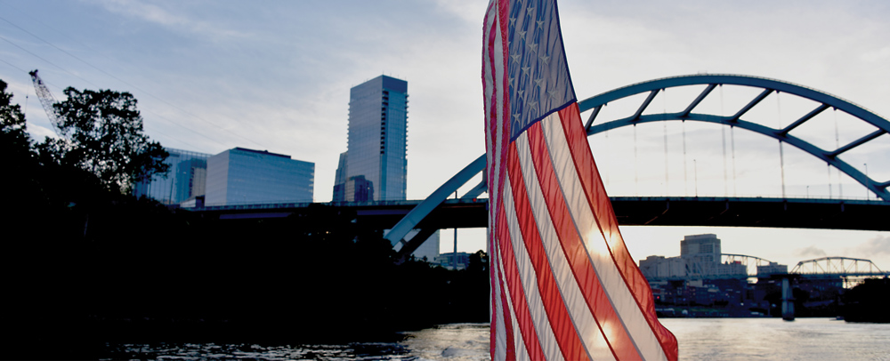 American Flag with Nashville in the background